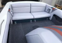 A 2011 Ski Nautique boat interior upholstered in custom marine vinyl colors, and new boat carpet installed throughout at Topskins Inc in Midvale, Utah and surrounding areas.